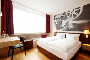 Отель arcona LIVING MÜNCHEN, Мюнхен